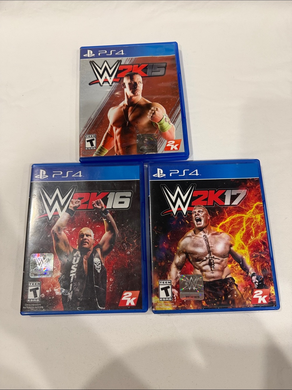 Sony PS4 WWE 2K15/2K16/2K17 Video Game Set - Blue Cases